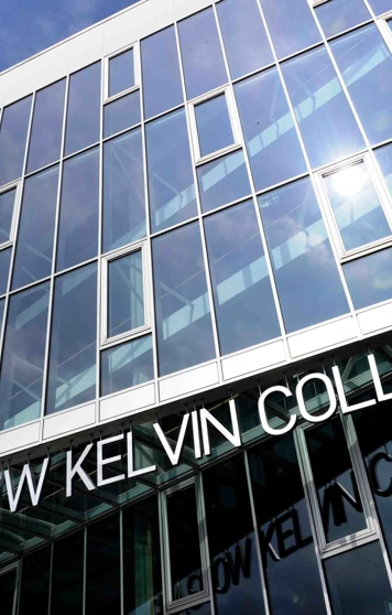Close-up of Glasgow Kelvin College Springburn Campus entrance, highlighting the building’s modern design and glass-panelled exterior. Close-up of Glasgow Kelvin College Springburn Campus entrance, highlighting the building’s modern design and glass-panelled exterior.